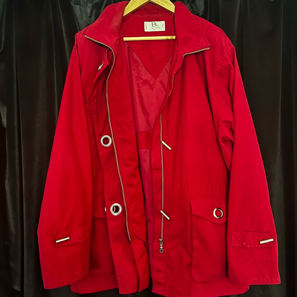 Red coat/jacket.Silver coloured adornments. Water repellent. Lined. Nautical - Picture 8 of 12